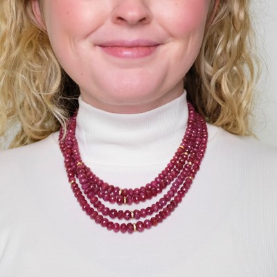 Lot 95 - Darlene de Sedle Four Strand Ruby Bead, High Karat Gold and Diamond Necklace