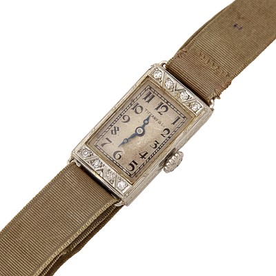 Lot 2274 - Tiffany & Co., Concord and Waltham Gold, Platinum and Diamond Wristwatch