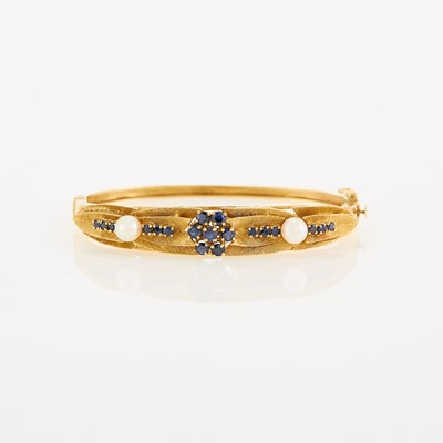 Lot 1165 - Gold, Cultured Pearl and Sapphire Bangle Bracelet