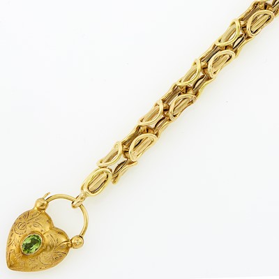 Lot 1170 - Gold and Peridot Link Charm Bracelet