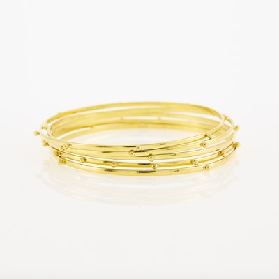 Lot 1163 - Five Gold Bangle Bracelets