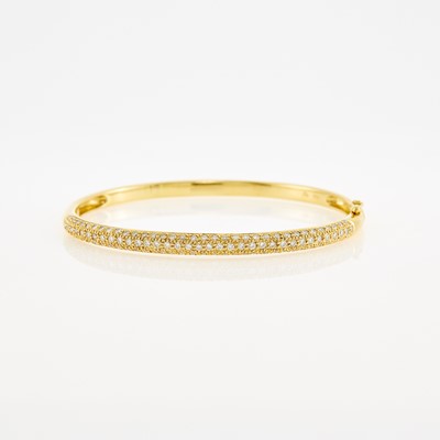 Lot 1147 - Gold and Diamond Bangle Bracelet