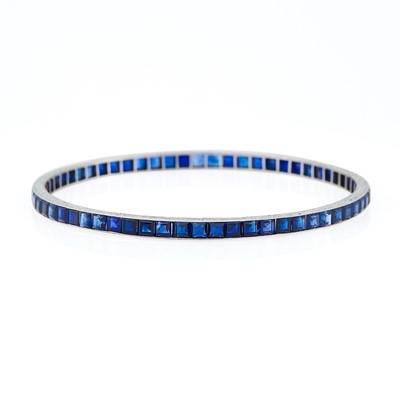 Lot 2093 - Platinum and Synthetic Sapphire Bangle Bracelet