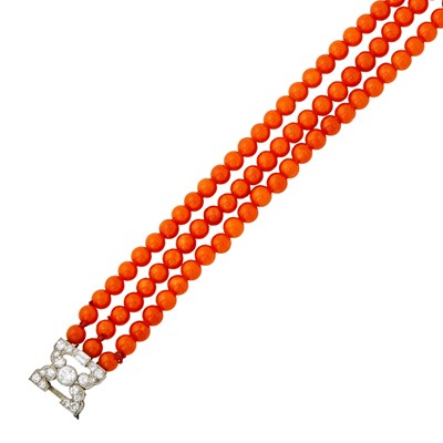Lot 2086 - Triple Strand Coral Bead Bracelet with Platinum and Diamond Clasp