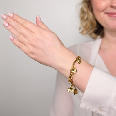 Lot 107 - Cartier Gold Charm Bracelet, France