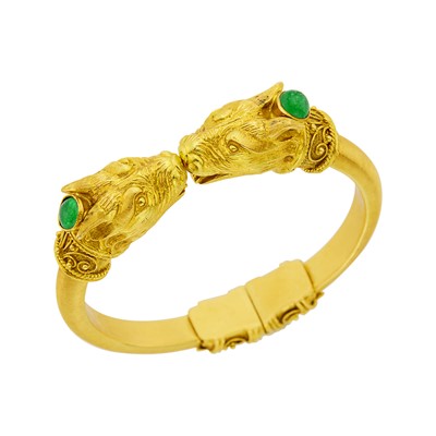 Lot 109 - Gold and Cabochon Emerald Animal Head Bangle Bracelet