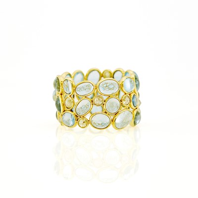 Lot 2139 - Wide Gold, Cabochon Aquamarine and Diamond Band Ring