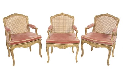 Lot 250 - Set of Three Louis XV Style Giltwood Caned Fauteuils