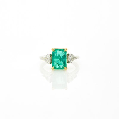 Lot 1141 - Two-Color Gold, Emerald and Diamond Ring