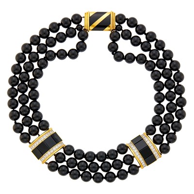 Lot 116 - Triple Strand Black Onyx Bead, Gold and Diamond Necklace