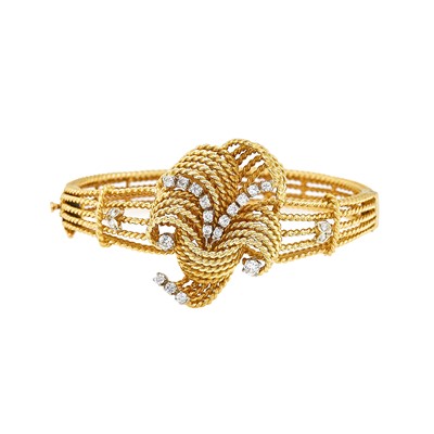 Lot 2211 - Two-Color Gold and Diamond Bangle Bracelet