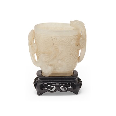 Lot 54 - A Chinese White Jade Cup and Stand
