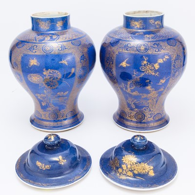Lot 660 - A Pair of Chinese Gilt Decorated Powder Blue Porcelain Baluster Jars and Covers
