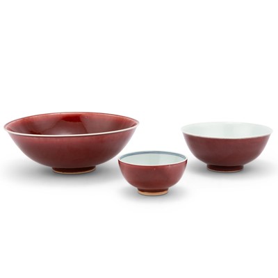 Lot 254 - A Group of Three Chinese Oxblood-Glazed Porcelain Bowls