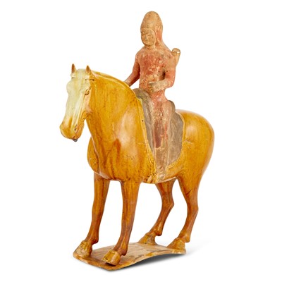 Lot 624 - A Chinese Ochre Glazed Pottery Figure of Equestrian