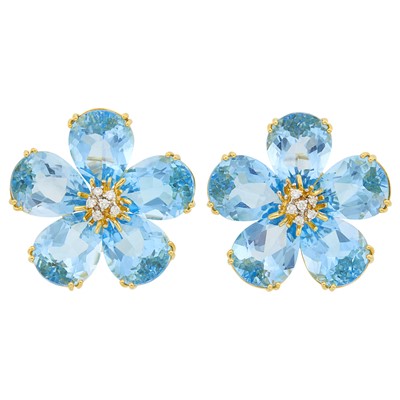 Lot 1069 - Pair of Gold, Blue Topaz and Diamond Flower Earclips