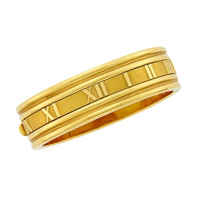 Lot 18 - Tiffany & Co. Gold 'Atlas' Bangle Bracelet