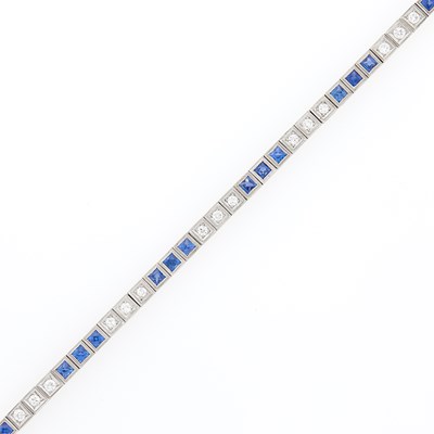 Lot 1206 - Platinum, Synthetic Sapphire and Diamond Bracelet