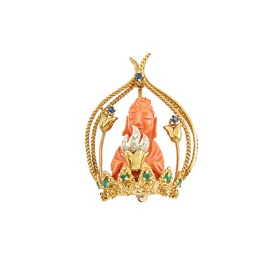 Lot 2185 - Gold, Carved Coral, Emerald, Sapphire and Diamond Buddha Brooch