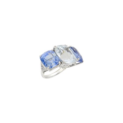Lot 1154 - White Gold, Colorless and Blue Sapphire Ring