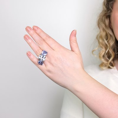 Lot 1154 - White Gold, Colorless and Blue Sapphire Ring
