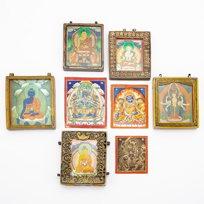 Lot 739 - A Group of Eight Tibetan Miniature Thangkas