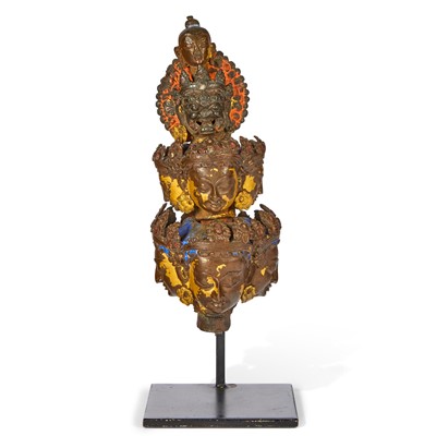 Lot 777 - A Tibetan Parcel-Gilt Bronze Head of Avalokiteshvara