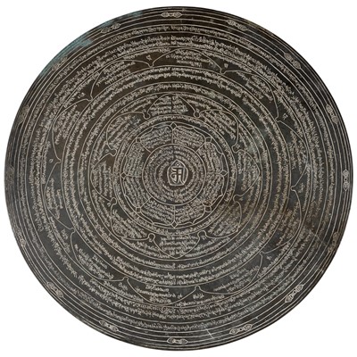 Lot 758 - A Tibetan Incised Bronze Disc