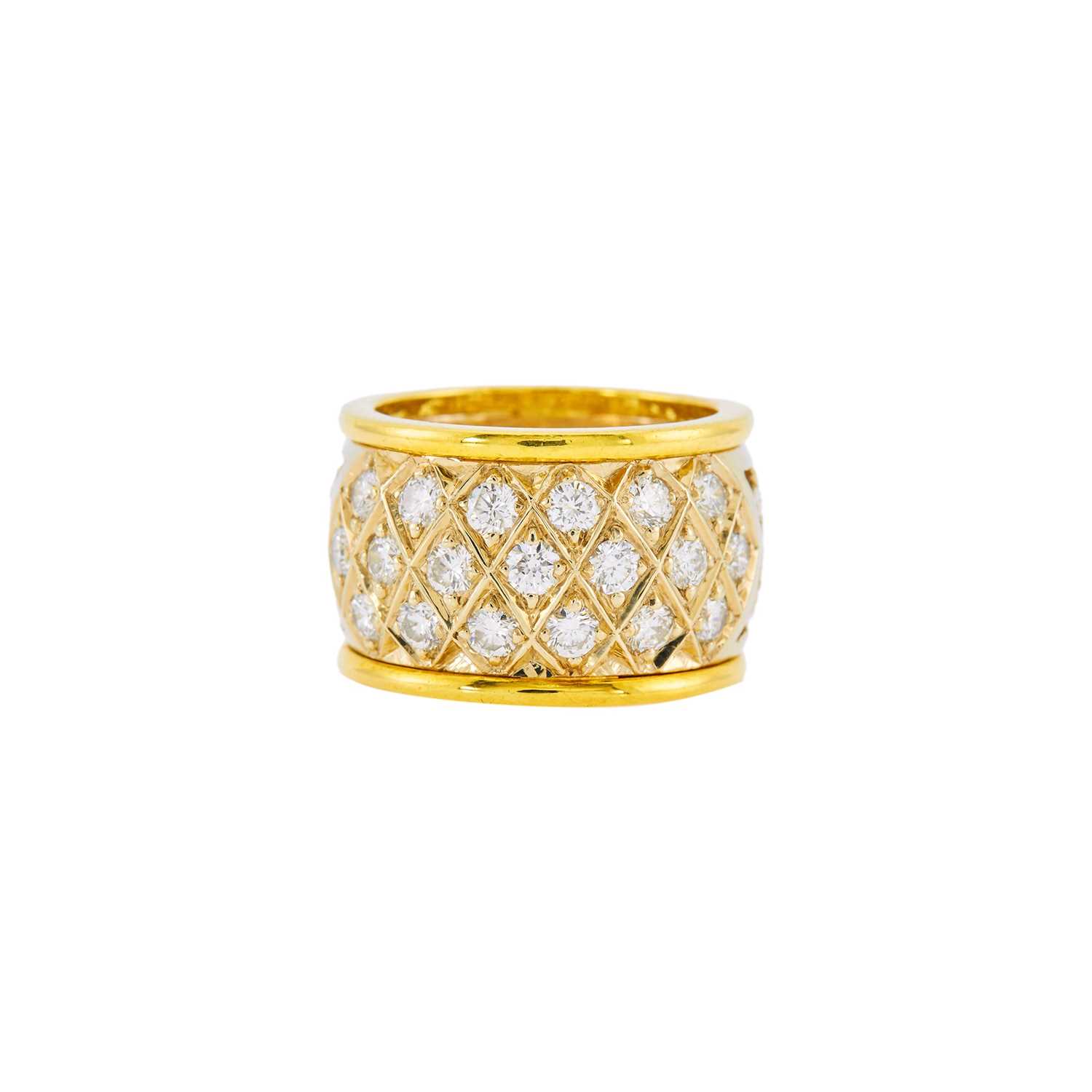 Lot 1035 - Two-Color Gold and Diamond Band Ring
