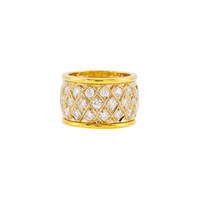 Lot 1035 - Two-Color Gold and Diamond Band Ring
