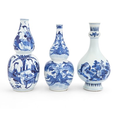Lot 667 - Three Chinese Blue and White Porcelain Bottle Vases