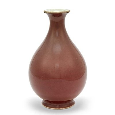 Lot 674 - A Chinese Copper-red 'Yuhuchun' Porcelain Bottle Vase