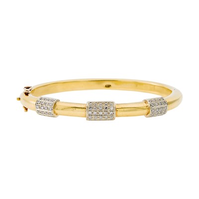 Lot 1089 - Two-Color Gold and Diamond Bangle Bracelet