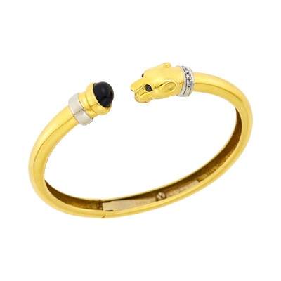 Lot 1170 - Two-Color Gold, Black Onyx, Cabochon Sapphire and Diamond Panther Head Bangle Bracelet