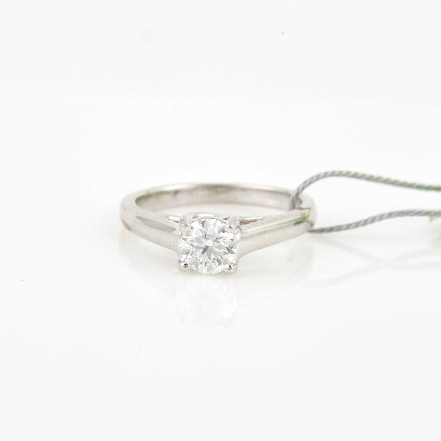 Lot 70 - Diamond Solitaire Ring about 0.80 ct., Platinum and 14K 2 dwt. all