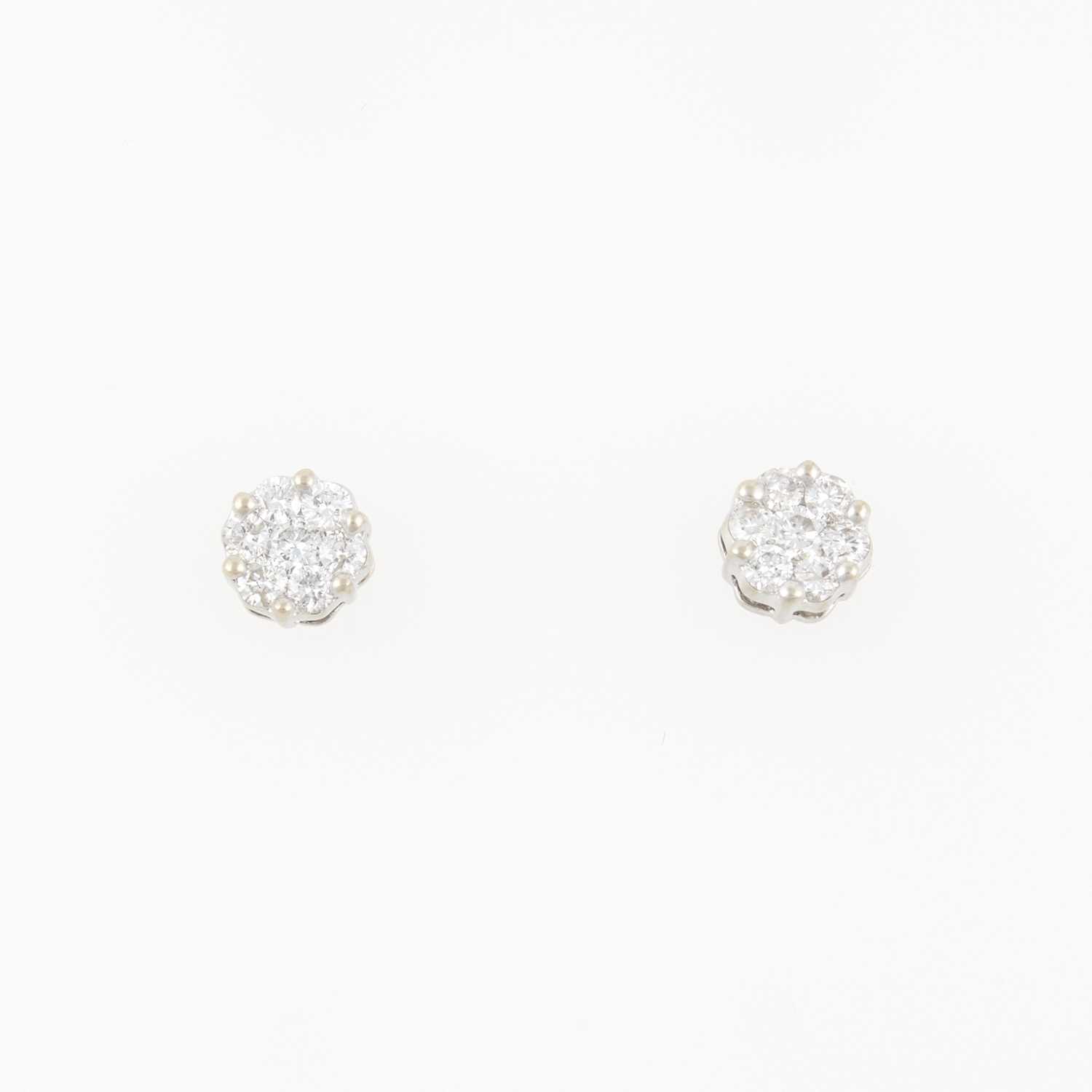 Lot 115 - Two Diamond Earrings, 14 diamonds about 1.00 ct., 14K 1 dwt.