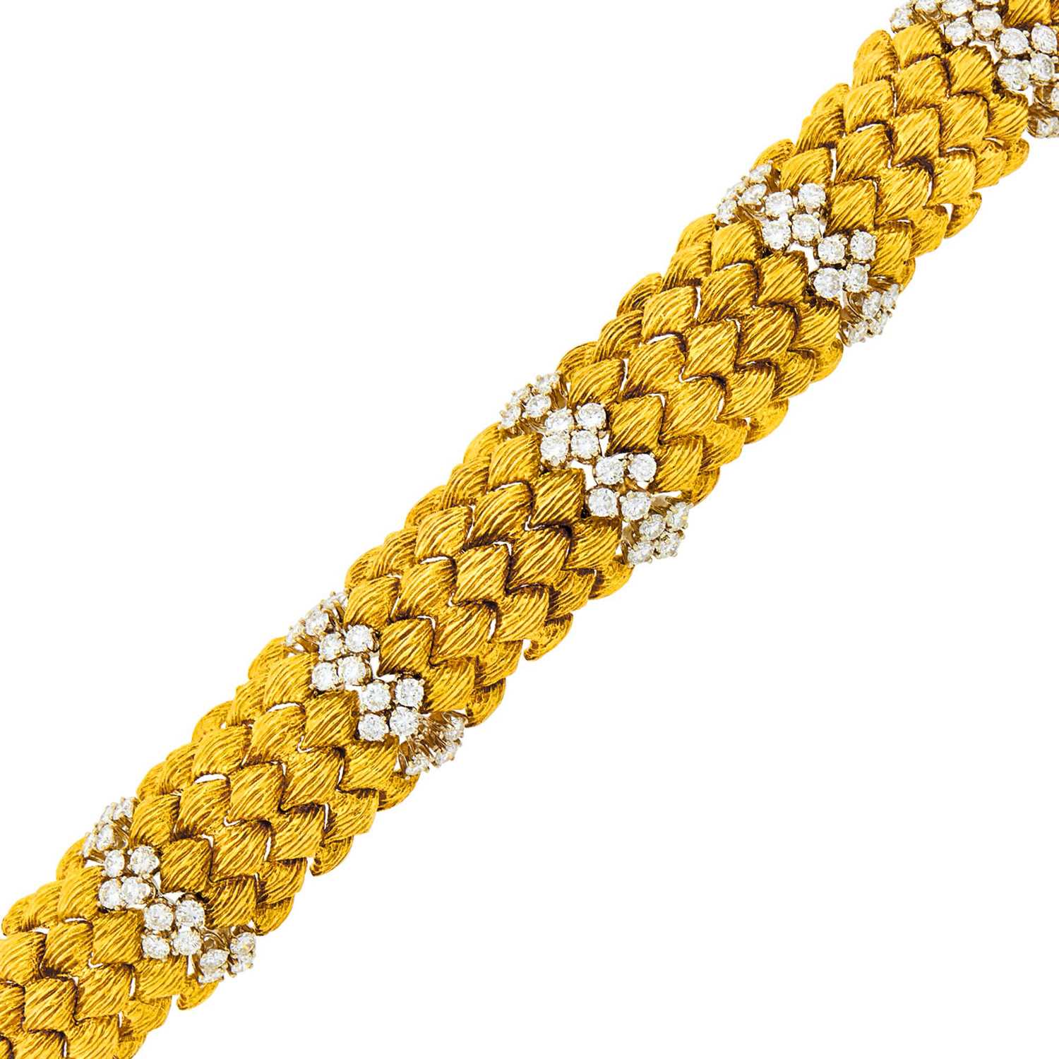 Lot 1201 - Two-Color Gold and Diamond Bracelet
