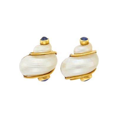 Lot 1174 - Seaman Schepps Pair of Gold, Shell and Cabochon Sapphire 'Turbo Shell' Earclips