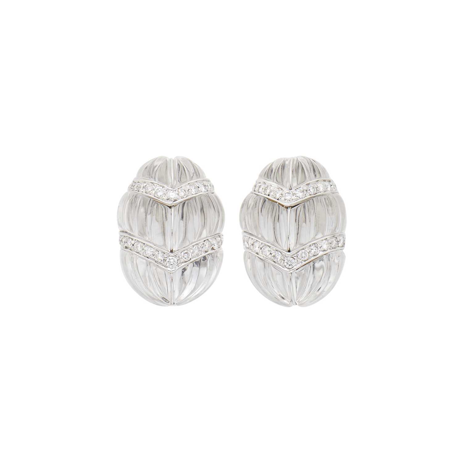 Lot 1049 - Pair of White Gold, Carved Rock Crystal and Diamond Earclips
