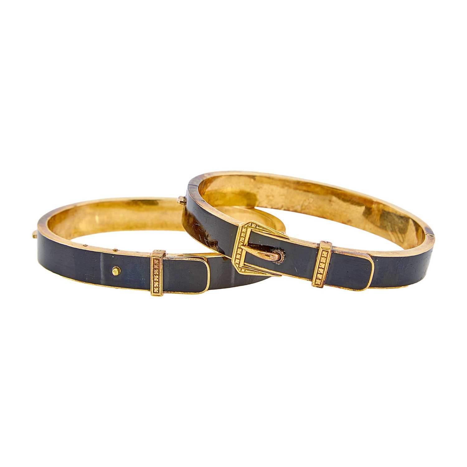 Lot 1110 - Two Antique Gold and Black Enamel Buckle Bangle Bracelets