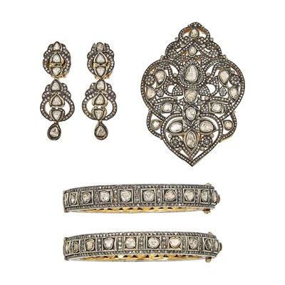 Lot 1073 - Two Indian Gold, Silver, Metal and Foil-Backed Diamond Bangle Bracelets, Pair of Earclips and Pendant