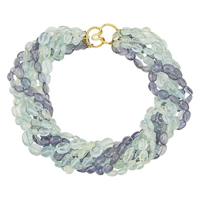 Lot 1315 - Eight Strand Tumbled Iolite and Aquamarine Bead Necklace with Gold Clasp