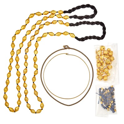 Lot 1285 - Pair of Silver-Gilt Bead Necklaces and Torque Necklace, Gold Torque Necklace and Bead Fragments