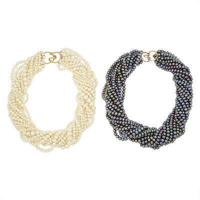 Lot 1319 - Two Multistrand Cultured and Black Freshwater Pearl Torsade Necklaces with Gold Clasps