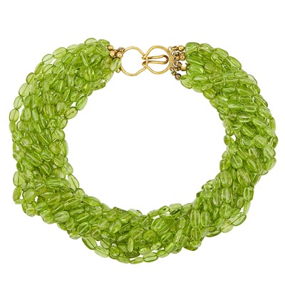 Lot 1325 - Thirteen Strand Peridot Bead Torsade Necklace with Silver-Gilt Clasp