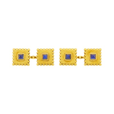 Lot 1040 - Cartier Pair of Gold and Cabochon Sapphire Cufflinks