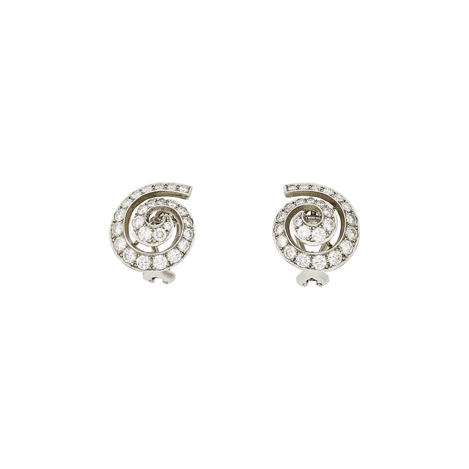 Lot 1187 - Pair of Platinum and Diamond Swirl Earrings