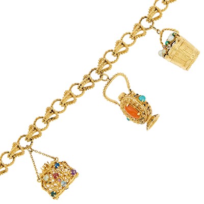 Lot 1104 - Gold and Gem-Set Charm Bracelet