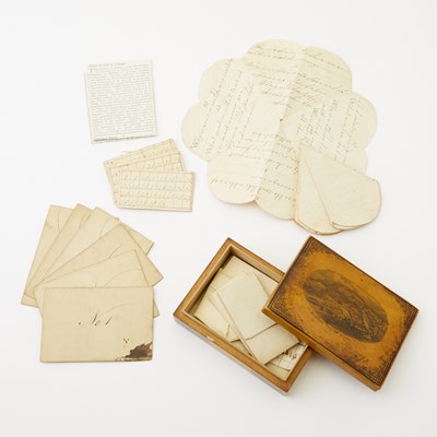 Lot 447 - A group of handwritten puzzles in an attractive satinwood box