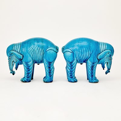 Lot 601 - A Pair of Chinese Export Turquoise Glazed Porcelain Elephants